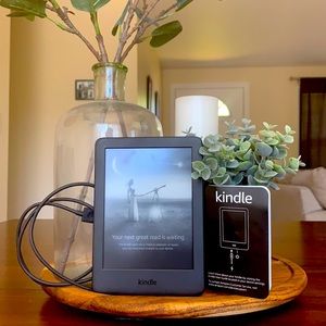 Kindle touch screen, backlit e-reader!